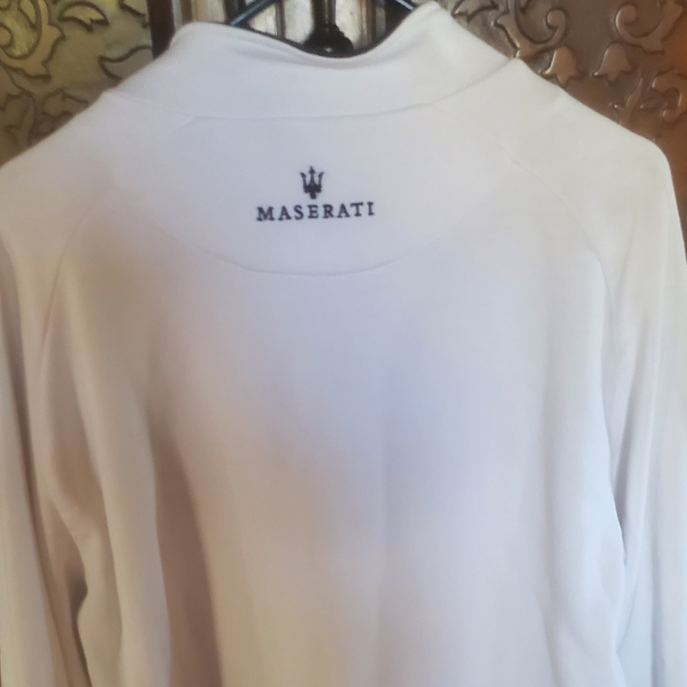 Front zipper sweatshirt. No hood. Fits size 16-18 womens